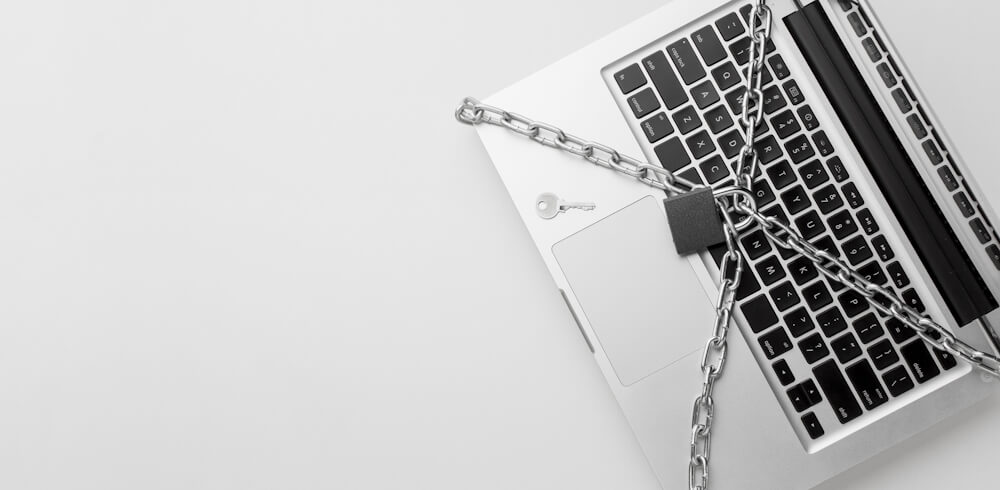 5 of the most convincing cyber scams of 2024 - laptop padlocked